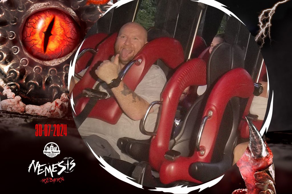 Nemesis Reborn ride photograph of me. 